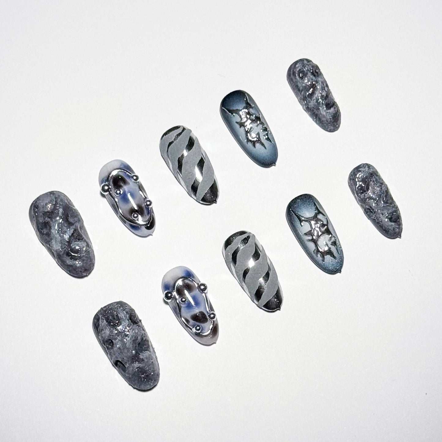 Set of decorative nail art designs on a white background