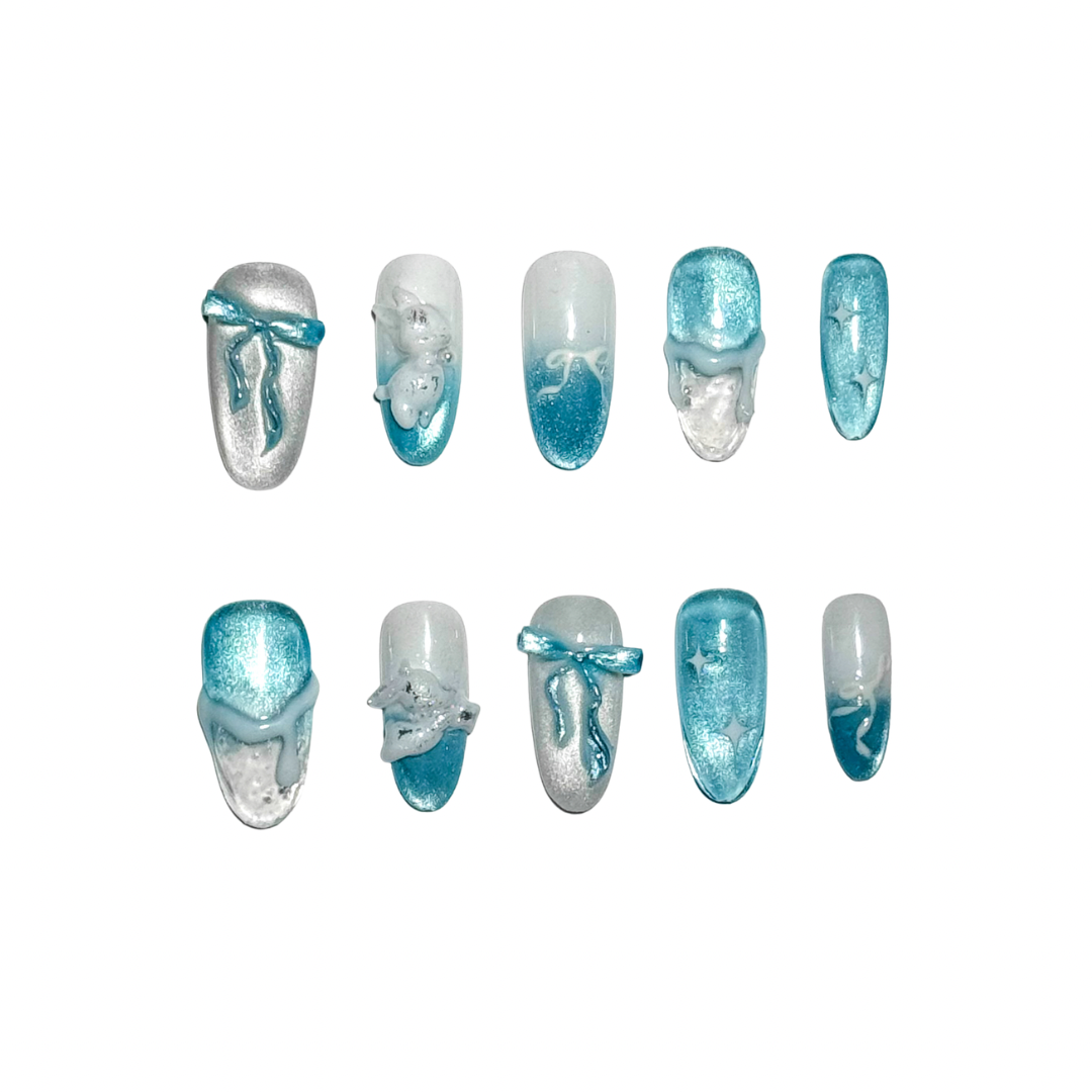 Set of blue and silver nail art designs on a white background